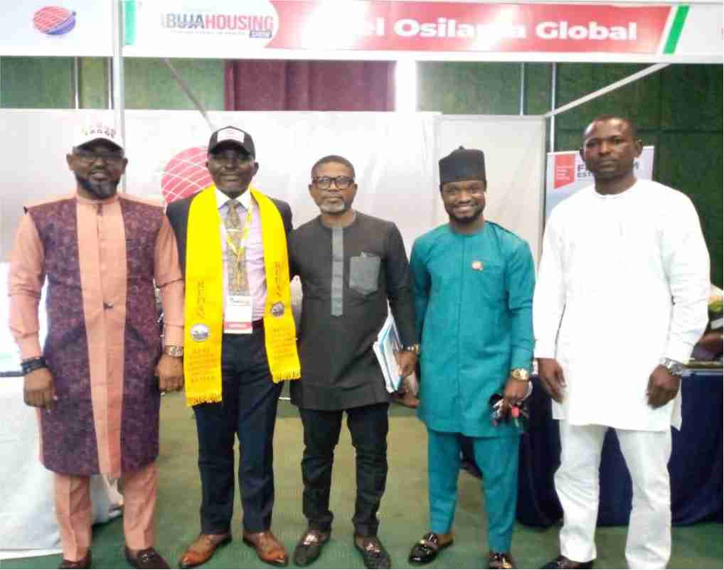 CEO with guests at Abuja Housing Show