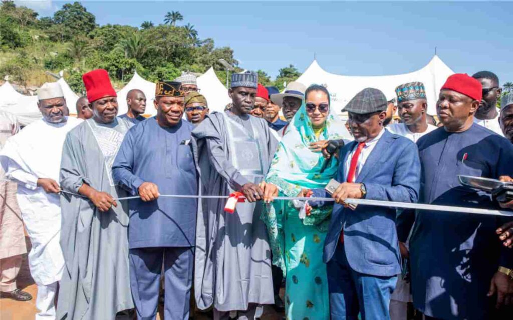 Sen. Abba Moro cutting the tape to declare the empowerment equipment ready for distribution
to the beneficiaries to mark one year in office of Sen. Natasha Akpoti-Uduaghan.